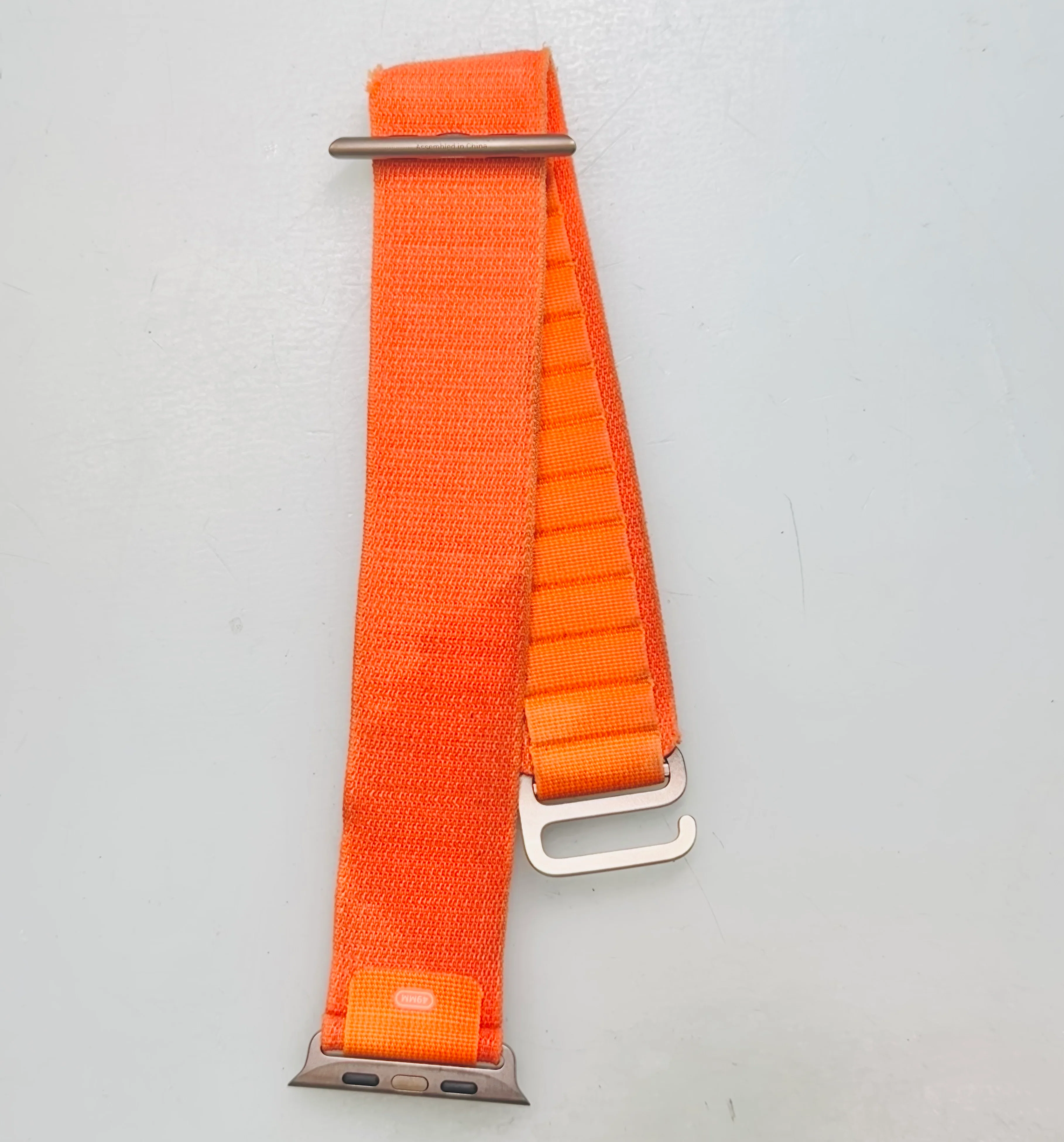 Apple 49mm Orange Alpine Loop Watch Band - Large - Natural Titanium - Image 2